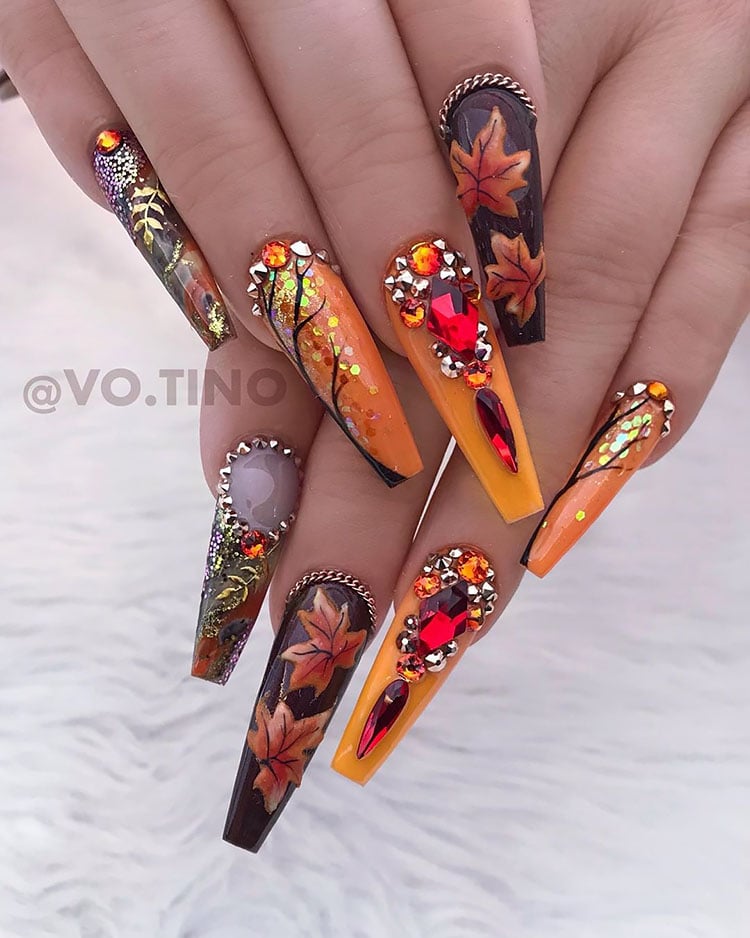 long orange and brown nails with leaves