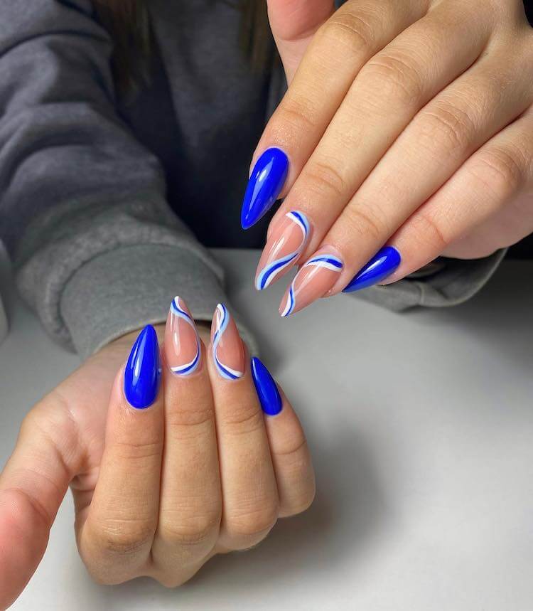 blue and white swirl nails