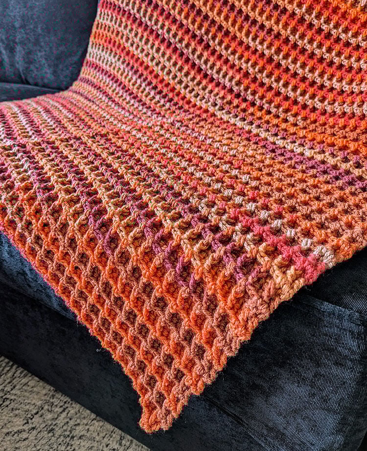 waffle stitch crochet blanket on chair