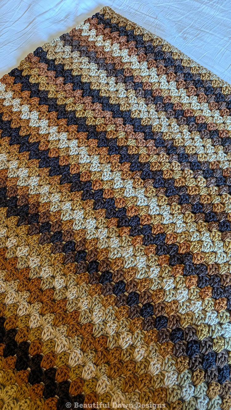 Vintage Granny Stripe Blanket on Bed
